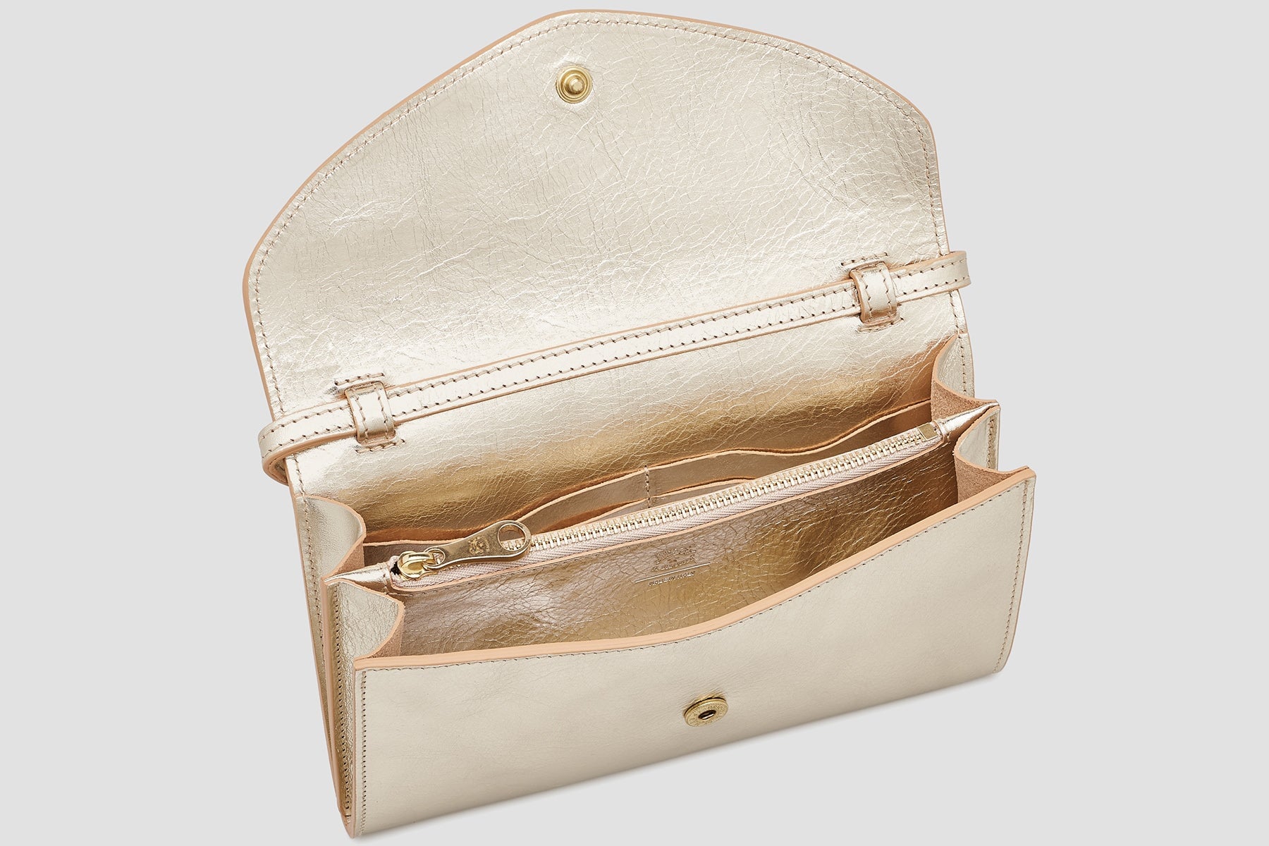 Clutch & Crossbodybag aus laminiertem Naturleder in Platingold Taschen Clutches Il Bisonte