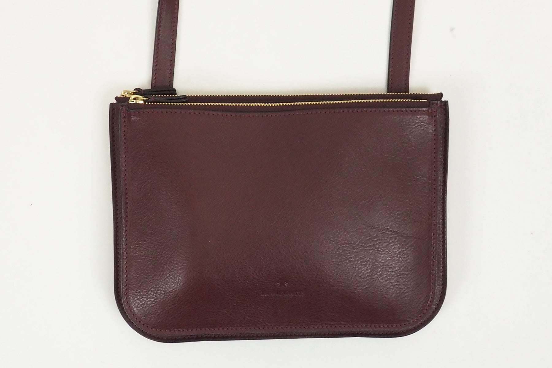 Flache Crossbodybag aus Naturleder in Bordeaux Taschen Crossbody & Schultertaschen Il Bisonte