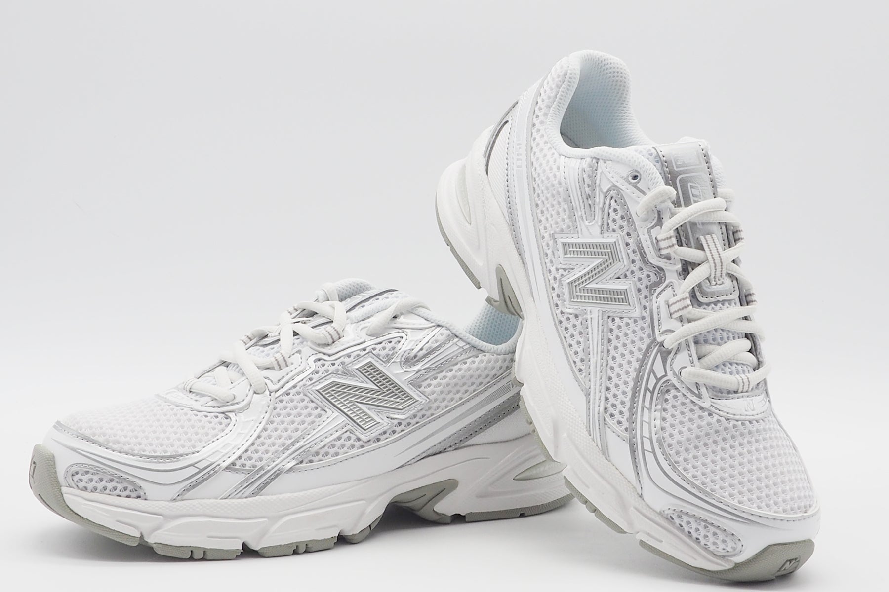 Stylischer Damen Sneaker 740 aus Mesh & Eco-Pelle in Weiß & Silber Damen Sneaker New Balance