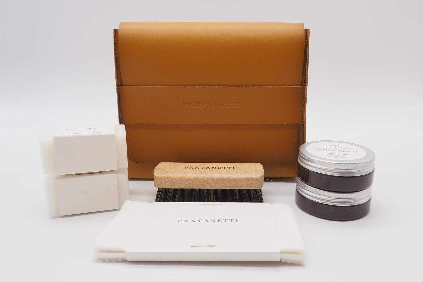 Schuhpflegeset in Clutchbag aus Leder in Gelb Tasche Clutches Pantanetti