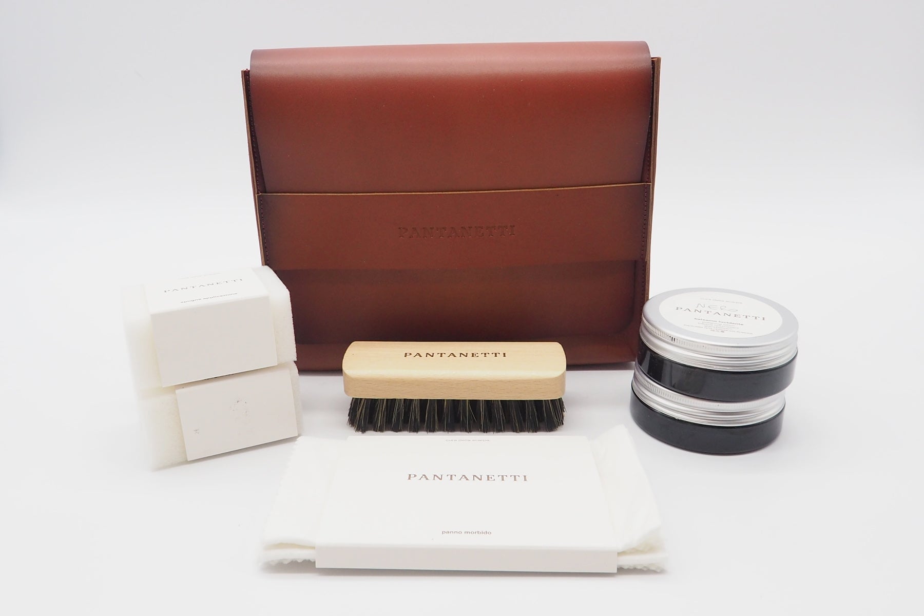 Schuhpflegeset in Clutchbag aus Leder in Rost Tasche Clutches Pantanetti