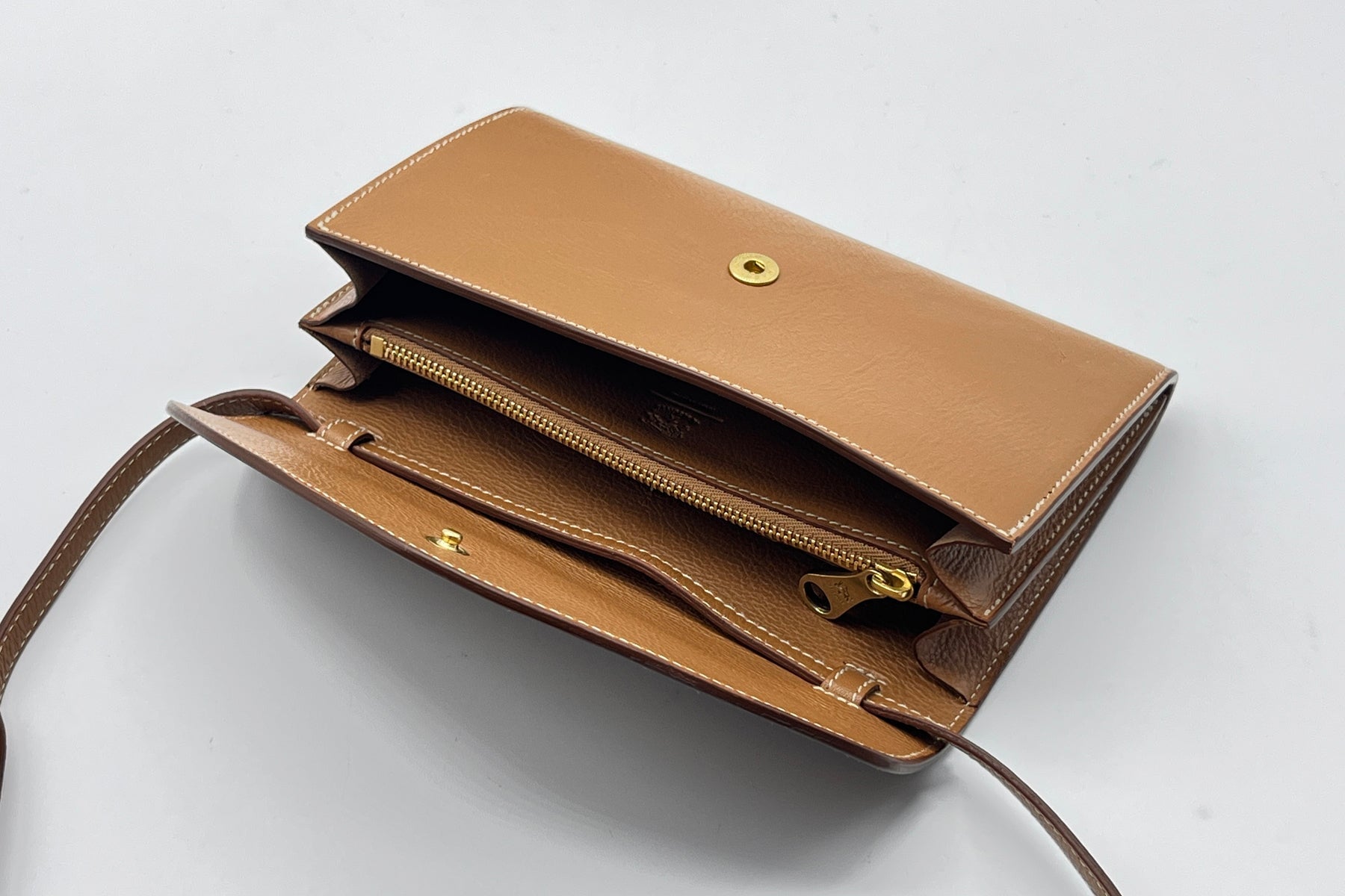 Clutch zum Umhängen aus Naturleder in Hellbraun mit Innenfächern Taschen Clutches Il Bisonte 