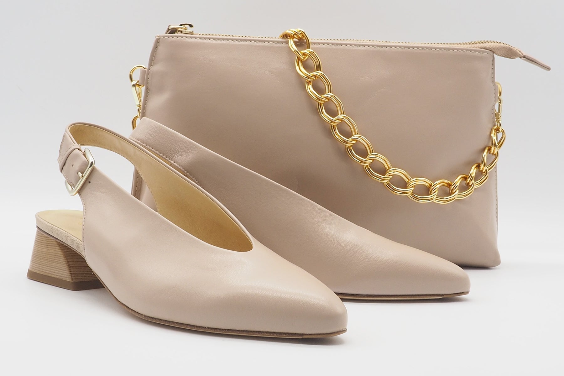 Damen Tasche aus Leder in Nude - mit Lederriemen & Metallkette Damen Clutchbag Brunate 