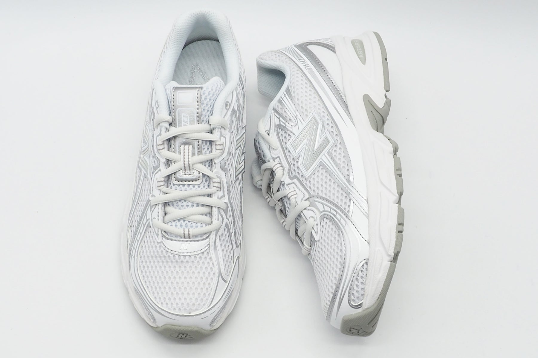 Stylischer Damen Sneaker 740 aus Mesh & Eco-Pelle in Weiß & Silber Damen Sneaker New Balance 
