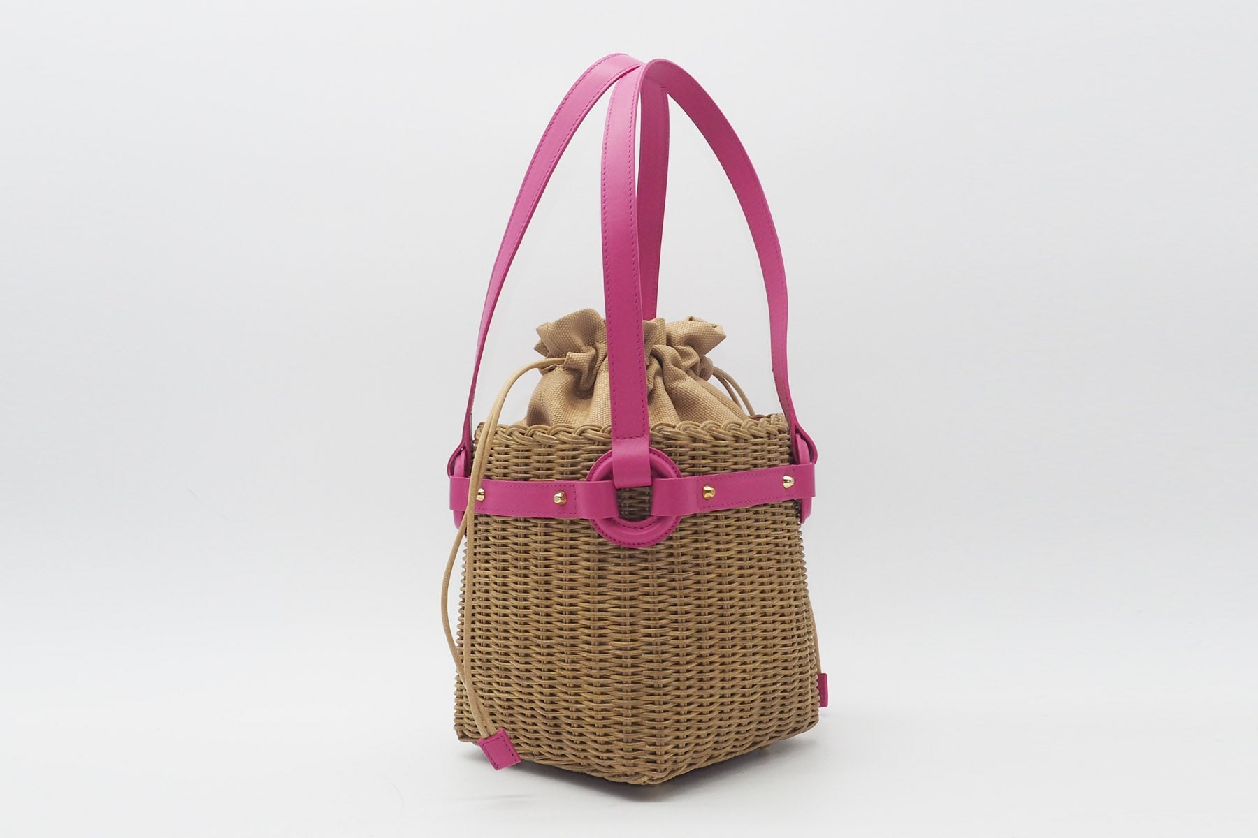 Korbtasche aus handgeflochtener Weide in Natur mit pinkem Leder Taschen Klein & Chic Capaf 
